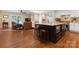 Open concept kitchen with a large island and living room at 4485 River Oaks Rd, Lake Wylie, SC 29710
