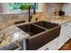 Close up on sink, countertop, and cabinetry in newly remodeled kitchen at 4485 River Oaks Rd, Lake Wylie, SC 29710
