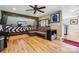 Cozy living room with hardwood floors, comfortable seating, and ample space for relaxation and entertainment at 4485 River Oaks Rd, Lake Wylie, SC 29710