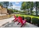 Spacious patio with outdoor seating overlooking a lush yard and lake at 4485 River Oaks Rd, Lake Wylie, SC 29710