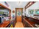 Rustic wet bar featuring wooden countertops, cabinetry, and fixtures, with a door leading outside at 4485 River Oaks Rd, Lake Wylie, SC 29710