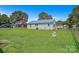 Spacious backyard with lush green grass and a fenced perimeter at 4555 Us 601 Hwy, Salisbury, NC 28147