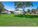 Spacious green lawn with a view of the home's exterior and surrounding neighborhood at 4555 Us 601 Hwy, Salisbury, NC 28147
