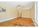 Bright living room featuring hardwood floors, a ceiling fan, and ample natural light at 4555 Us 601 Hwy, Salisbury, NC 28147