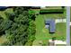 Aerial shot of home on expansive lot showing lush greenery and a private backyard at 50 Isenhour Park Rd, Taylorsville, NC 28681