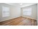 Bright bedroom featuring wood floors and large windows with natural light at 5375 Eneida Sue Dr, Charlotte, NC 28214