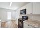 Bright kitchen featuring modern appliances and light countertops, complemented by hardwood floors at 5375 Eneida Sue Dr, Charlotte, NC 28214