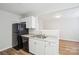 Efficient kitchen layout featuring stainless steel appliances, granite counters, and ample storage at 5375 Eneida Sue Dr, Charlotte, NC 28214