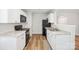 Modern kitchen with granite countertops, stainless steel appliances, and ample cabinet space at 5375 Eneida Sue Dr, Charlotte, NC 28214