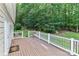 Back deck with white railing overlooking mature trees at 5890 Alley Rd, Catawba, NC 28609