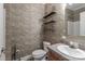 Cozy powder room with wallpaper, modern fixtures, and tiled floors at 5890 Alley Rd, Catawba, NC 28609