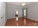 Bedroom with hardwood floors and entry to main bath at 5890 Alley Rd, Catawba, NC 28609