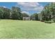 Distant view of a charming home with a sprawling green lawn and mature trees at 5890 Alley Rd, Catawba, NC 28609