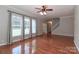 Living room featuring hardwood floors, large windows, and neutral wall colors at 5890 Alley Rd, Catawba, NC 28609
