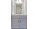 Beautiful bathroom vanity with a large mirror and modern lighting at 6274 Tea Olive Dr # 237, Harrisburg, NC 28075