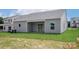 Spacious backyard featuring an outdoor patio, offering a serene space for relaxation and outdoor activities at 7106 Jerimoth Dr, Charlotte, NC 28215