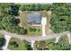 Overhead view of a home showcasing its roof, landscaping, and long driveway at 738 Kemp Rd, Mooresville, NC 28117