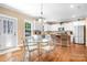 Updated kitchen featuring stainless steel appliances and an island at 738 Kemp Rd, Mooresville, NC 28117