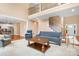 Spacious living room with staircase, second story balcony, hardwood floors, and view of open kitchen at 738 Kemp Rd, Mooresville, NC 28117