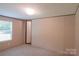 Bright bedroom featuring neutral carpeting and a large window with natural light at 812 Acclaim Dr, York, SC 29745