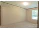 Cozy bedroom with neutral carpeting, window with blinds, and ample closet space at 812 Acclaim Dr, York, SC 29745