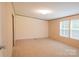 Bedroom with neutral colored carpet and a window that allows ample natural light at 812 Acclaim Dr, York, SC 29745
