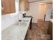 Kitchen featuring stainless steel sink, appliances, and bright lighting at 812 Acclaim Dr, York, SC 29745