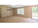 Inviting living room featuring natural light from large windows and a seamless transition to the outdoor porch at 812 Acclaim Dr, York, SC 29745