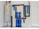 Basement features a hot water heater and other utility hardware at 10009 Community House Rd, Charlotte, NC 28277