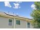 Exterior view showcasing modern solar panels on the roof of the home at 10009 Community House Rd, Charlotte, NC 28277