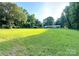 Lush backyard with ample open space, offering a serene and private setting at 114 Huffstetler Rd, Gastonia, NC 28056