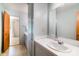 Bathroom with a white sink vanity and a large mirror at 114 Huffstetler Rd, Gastonia, NC 28056