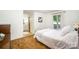 Cozy bedroom with a comfortable bed, neutral walls, and a convenient ensuite bathroom at 114 Huffstetler Rd, Gastonia, NC 28056