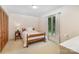 Bedroom featuring a bed, large window, and a spacious layout at 114 Huffstetler Rd, Gastonia, NC 28056
