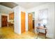 Hallway with adjacent kitchen boasts bright lighting, and an adjacent dining space at 114 Huffstetler Rd, Gastonia, NC 28056