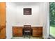 Home office space features a built-in desk, drawers and a view to the outdoors at 114 Huffstetler Rd, Gastonia, NC 28056