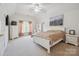 Comfortable bedroom with white furniture, carpet, and natural light at 12004 New Bond Dr, Huntersville, NC 28078