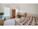 Bright bedroom with built-in bunk bed, shelves filled with toys, and natural light from windows at 12004 New Bond Dr, Huntersville, NC 28078
