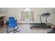 Bonus room featuring a window view and exercise equipment at 12004 New Bond Dr, Huntersville, NC 28078