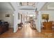 Grand foyer featuring gleaming hardwood floors and a soaring two-story ceiling at 12004 New Bond Dr, Huntersville, NC 28078