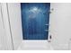 Bathroom with white subway tile and striking blue herringbone accent tile in the shower with glass shelves at 1300 Queens Rd # 405, Charlotte, NC 28207