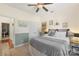 Bedroom with neutral colors and a ceiling fan and is adjacent to office at 14747 Pomerol Ln, Pineville, NC 28134