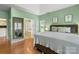 Spacious main bedroom features hardwood floors, fresh paint, and an en suite bathroom at 14747 Pomerol Ln, Pineville, NC 28134