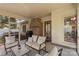 Inviting screened-in porch with comfortable seating and an outdoor space for relaxation at 14747 Pomerol Ln, Pineville, NC 28134