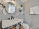 Stylish bathroom with a modern sink, decorative shelves, and fresh white towels at 1498 Legion Rd, Fort Mill, SC 29715