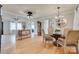 Open dining room with hardwood floors and elegant chandelier at 1498 Legion Rd, Fort Mill, SC 29715