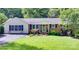 Charming single-story home features a well-manicured lawn and a mix of brick and siding exterior at 1498 Legion Rd, Fort Mill, SC 29715