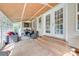 Inviting sunroom with a fireplace, comfortable seating, and large windows for ample natural light at 1498 Legion Rd, Fort Mill, SC 29715