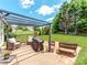 The outdoor pergola features stylish patio seating, grill and is perfect for relaxation at 1605 Ambergate Dr, Waxhaw, NC 28173