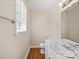 Standard bathroom featuring a single sink, toilet, and wood-look vinyl flooring at 197 Horseshoe Loop, Statesville, NC 28625